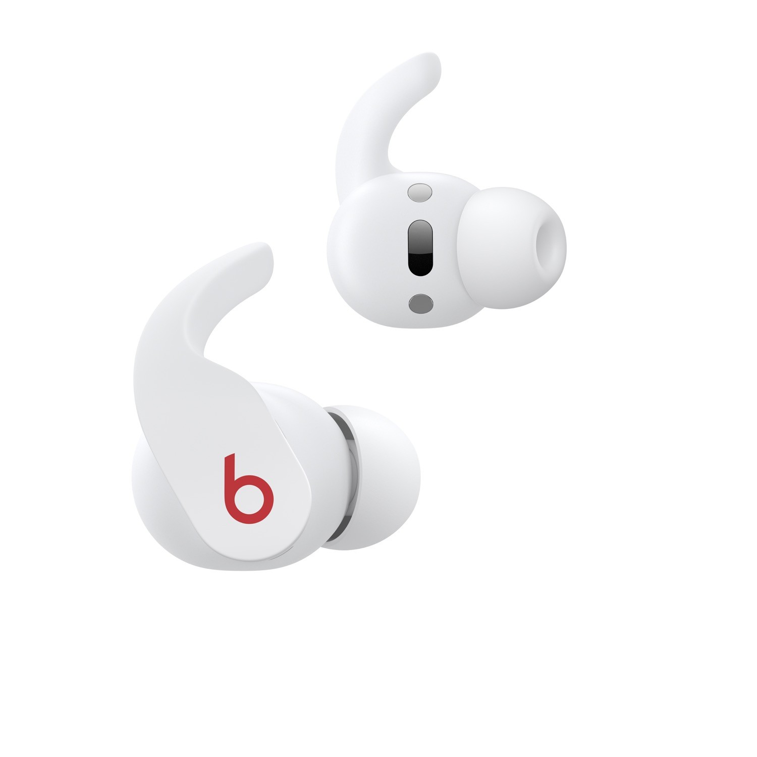 Auriculares Beats blancos. Un auricular en la oreja, el otro al lado.