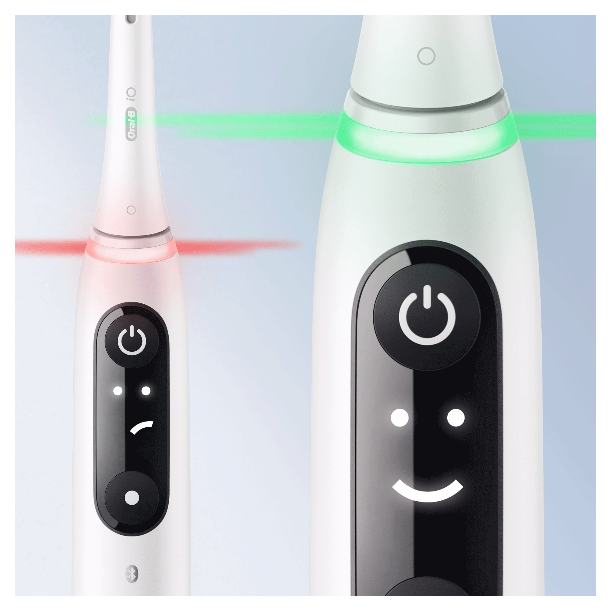 Két elektromos fogkefe, fehér, piros és zöld fénnyel, különböző kijelzőállapotokat mutat.