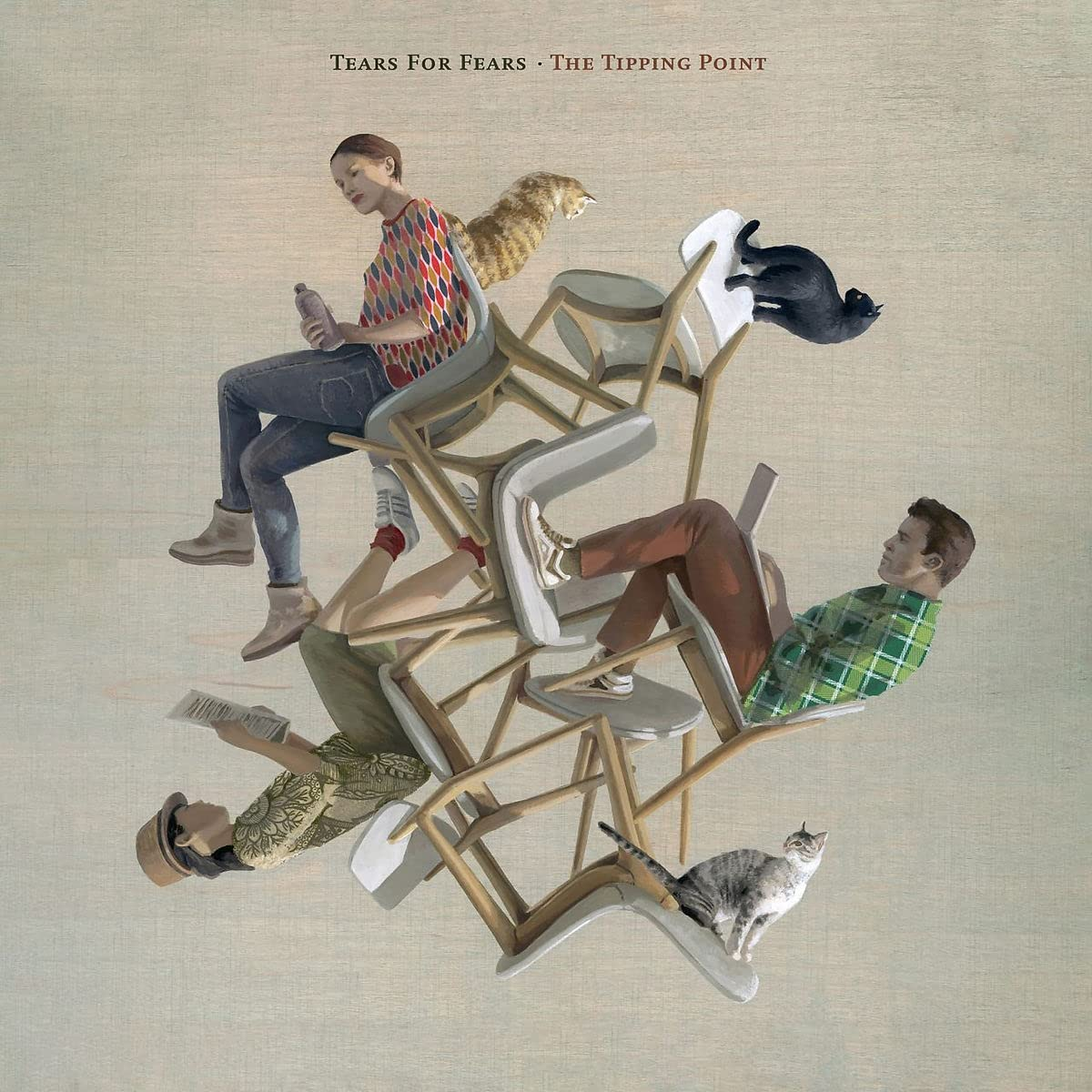 A 'Tears For Fears - The Tipping Point' album borítója. Emberek székek kupacán macskákkal.