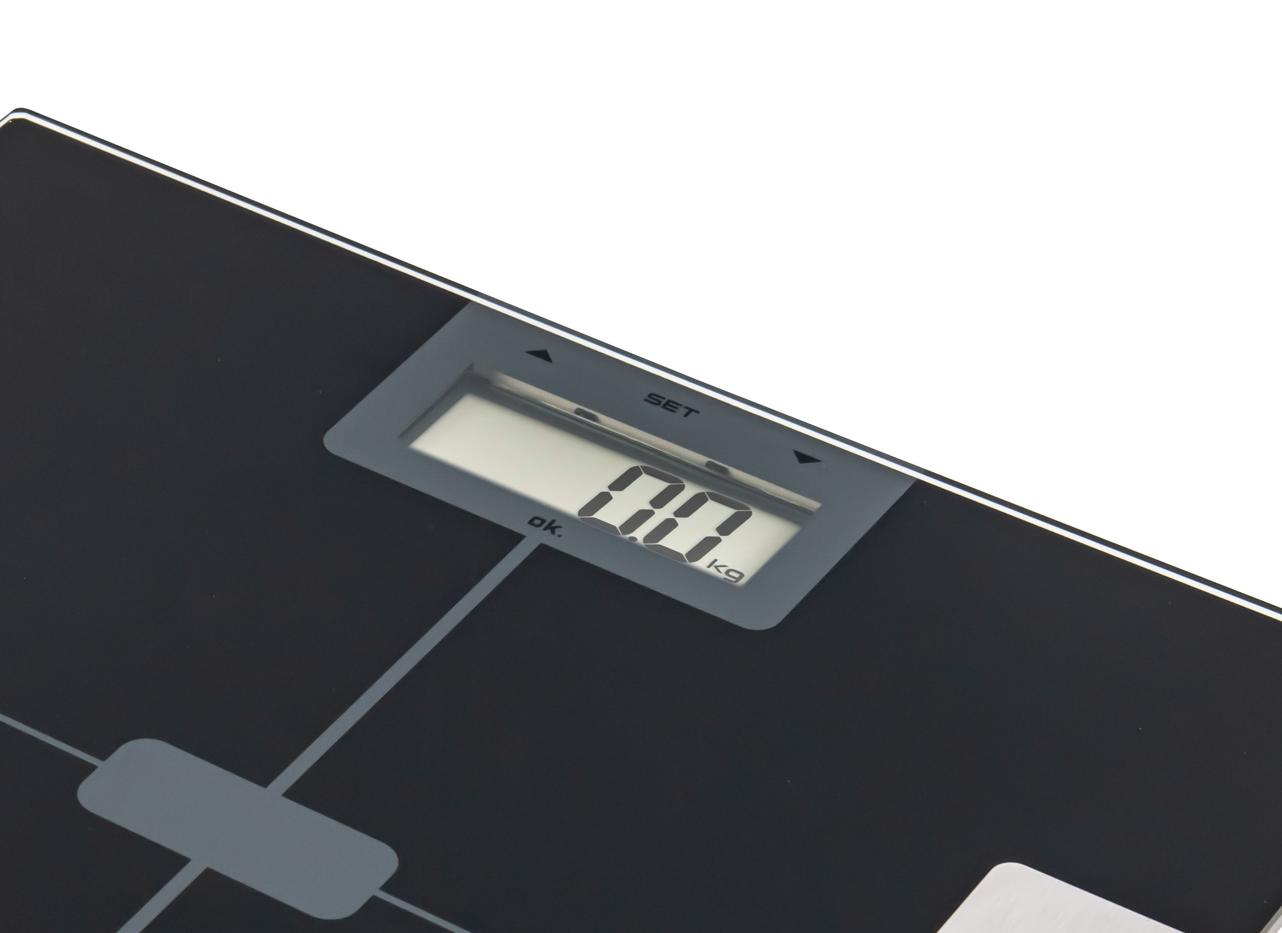 Digitale schwarze Waage mit „00 kg“. Die Waage befindet sich auf weißem Hintergrund.