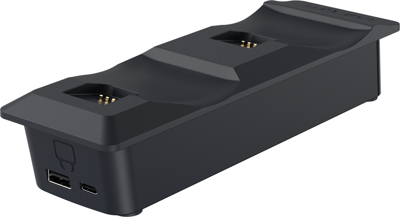 Egy fekete töltőállomás két töltőporttal és egy USB-porttal. Elegáns, szögletes kialakítású.
