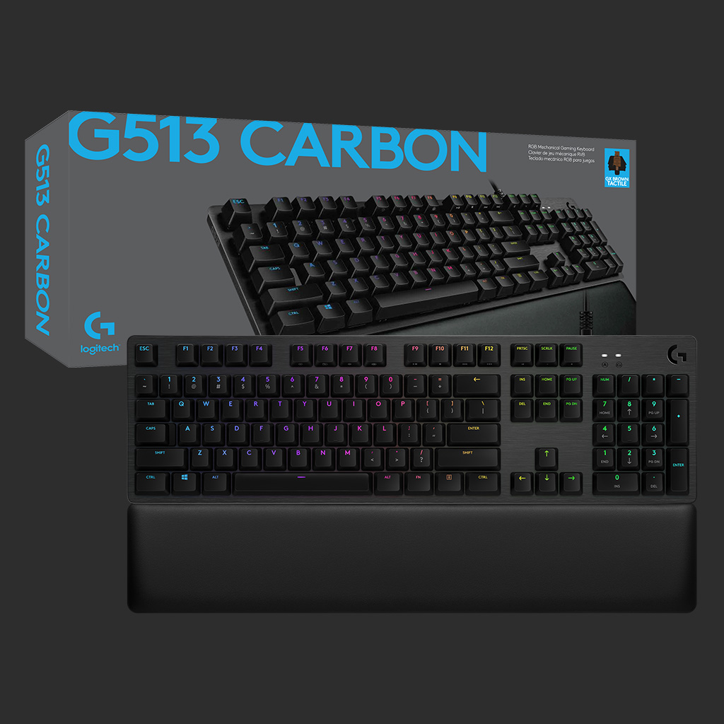 Clavier dans sa boîte. Clavier noir avec repose-poignet.