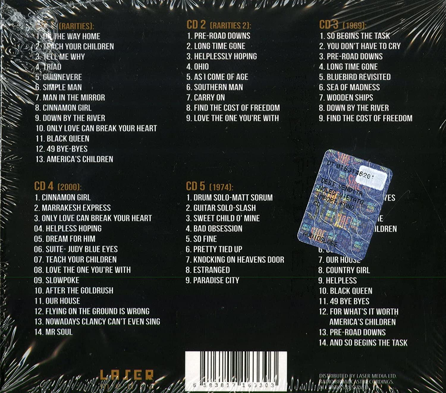 CDs mit Titellisten. Das Album hat einen Aufkleber mit holografischem Design.