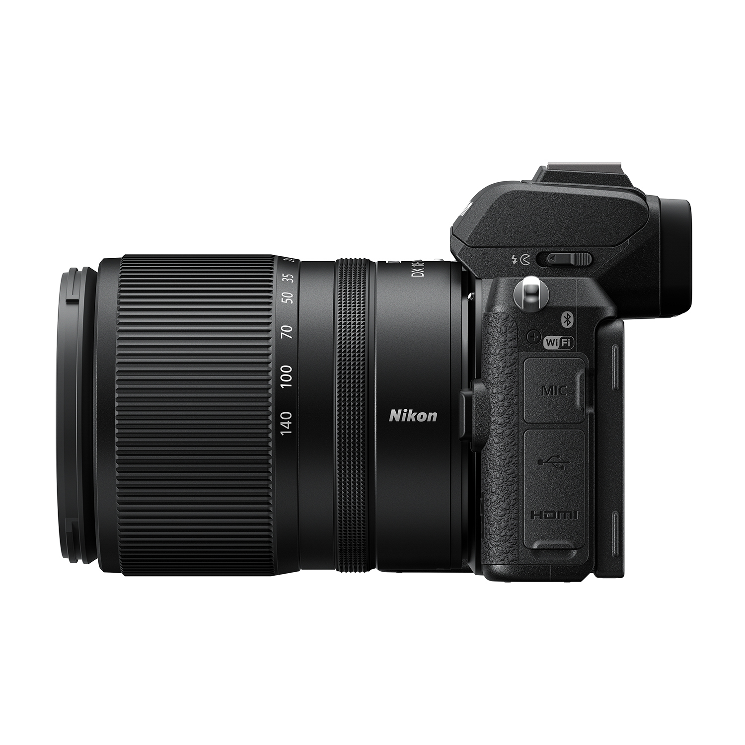 Fotocamera Nikon nera con obiettivo, vista laterale che mostra i controlli.