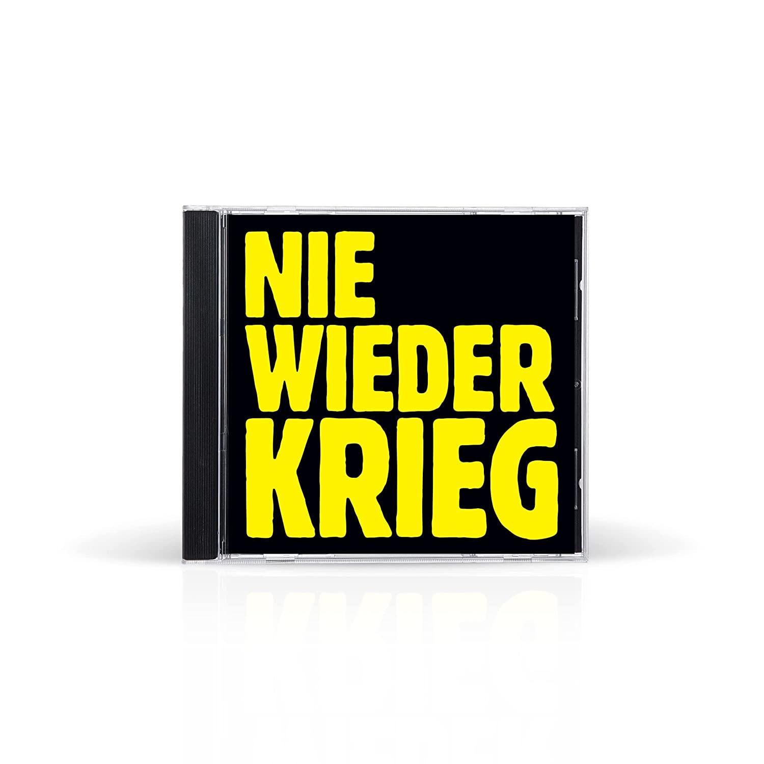 Ein CD-Case mit den gelben Worten "NIE WIEDER KRIEG" auf Schwarz. Das Case ist klar. Der Text ist fett.