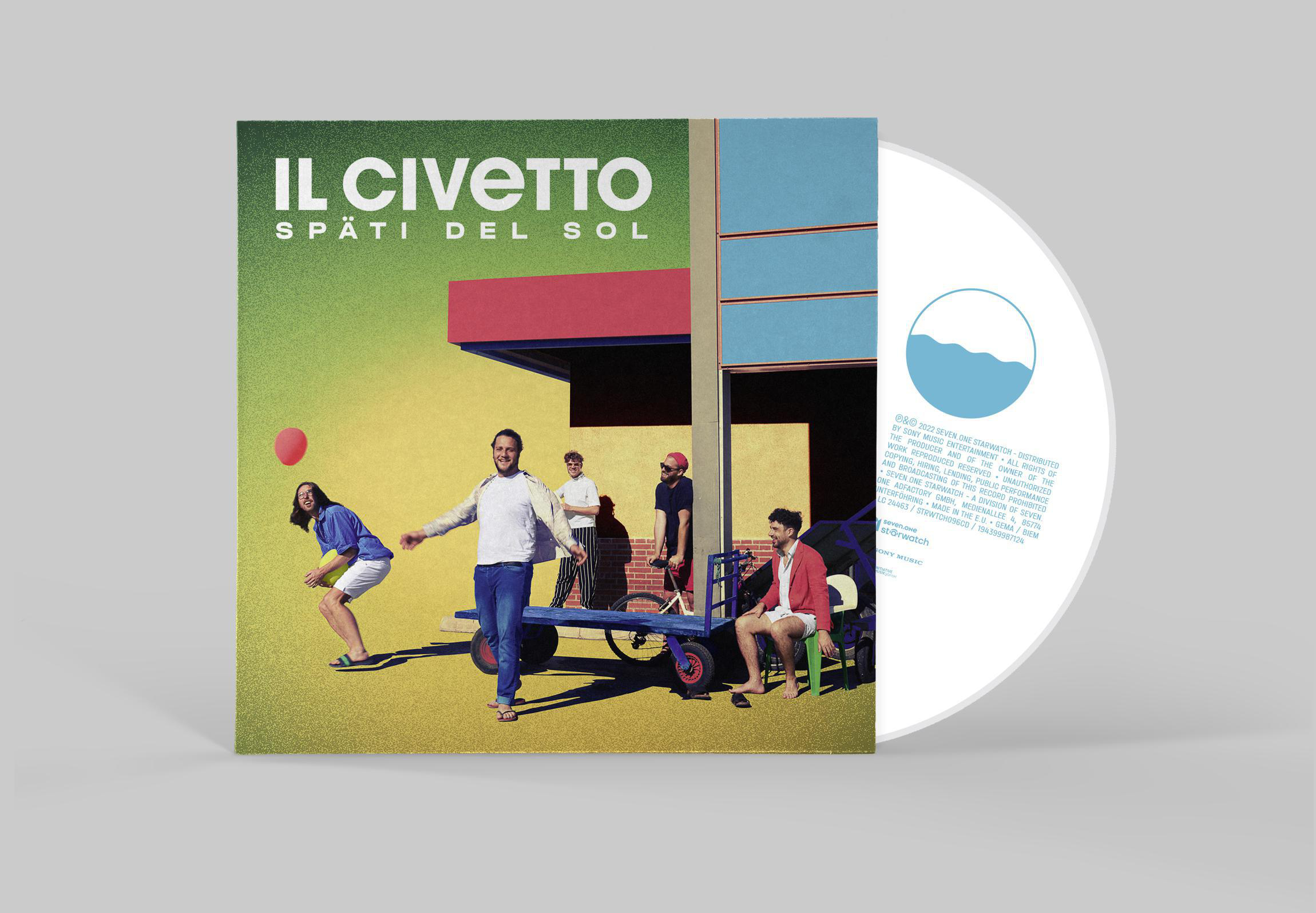 Albumcover mit einer Band auf einem Karren. Eine Schallplatte liegt daneben.