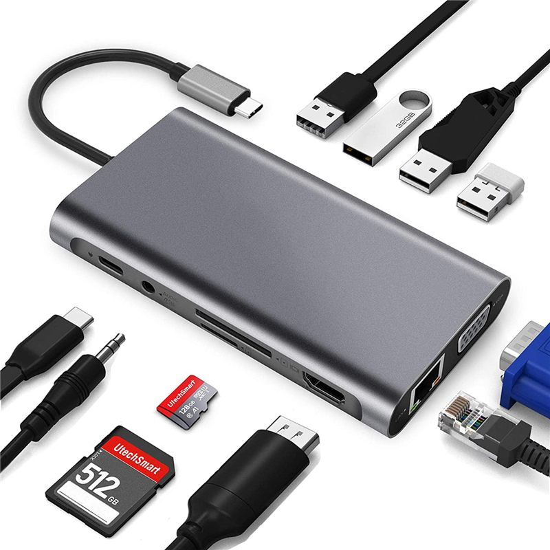 USB ve HDMI dahil olmak üzere çeşitli bağlantı noktalarına ve bağlı kablolara sahip gri hub.