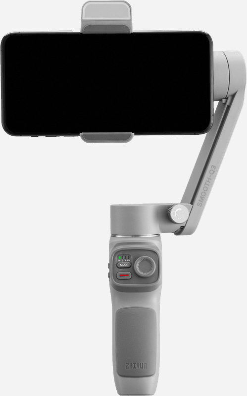 Grijze telefoonstabilisator. Telefoon bovenop. Heeft knoppen en een rood licht. Witte achtergrond.