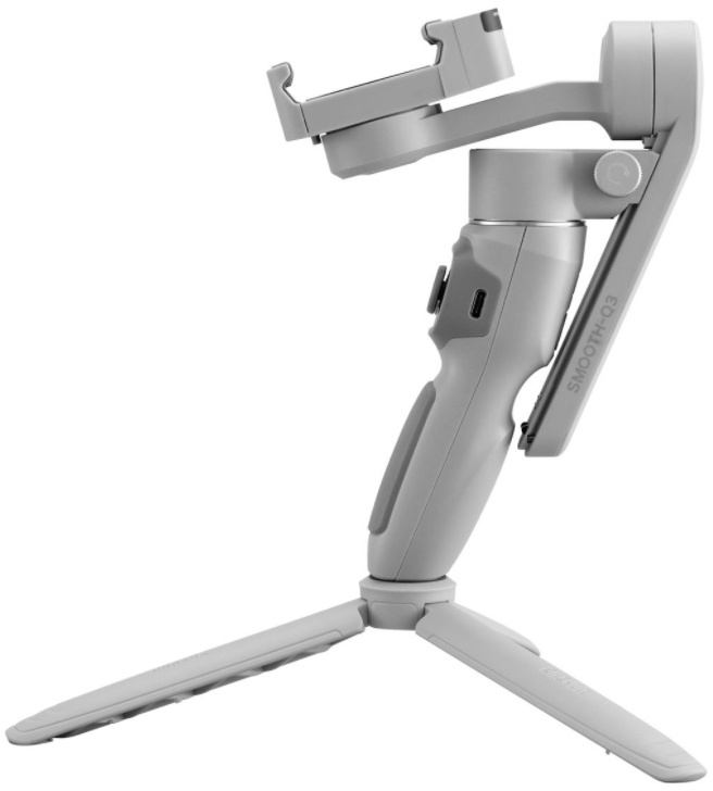Een handheld gimbal met een statief, in een studio-omgeving.