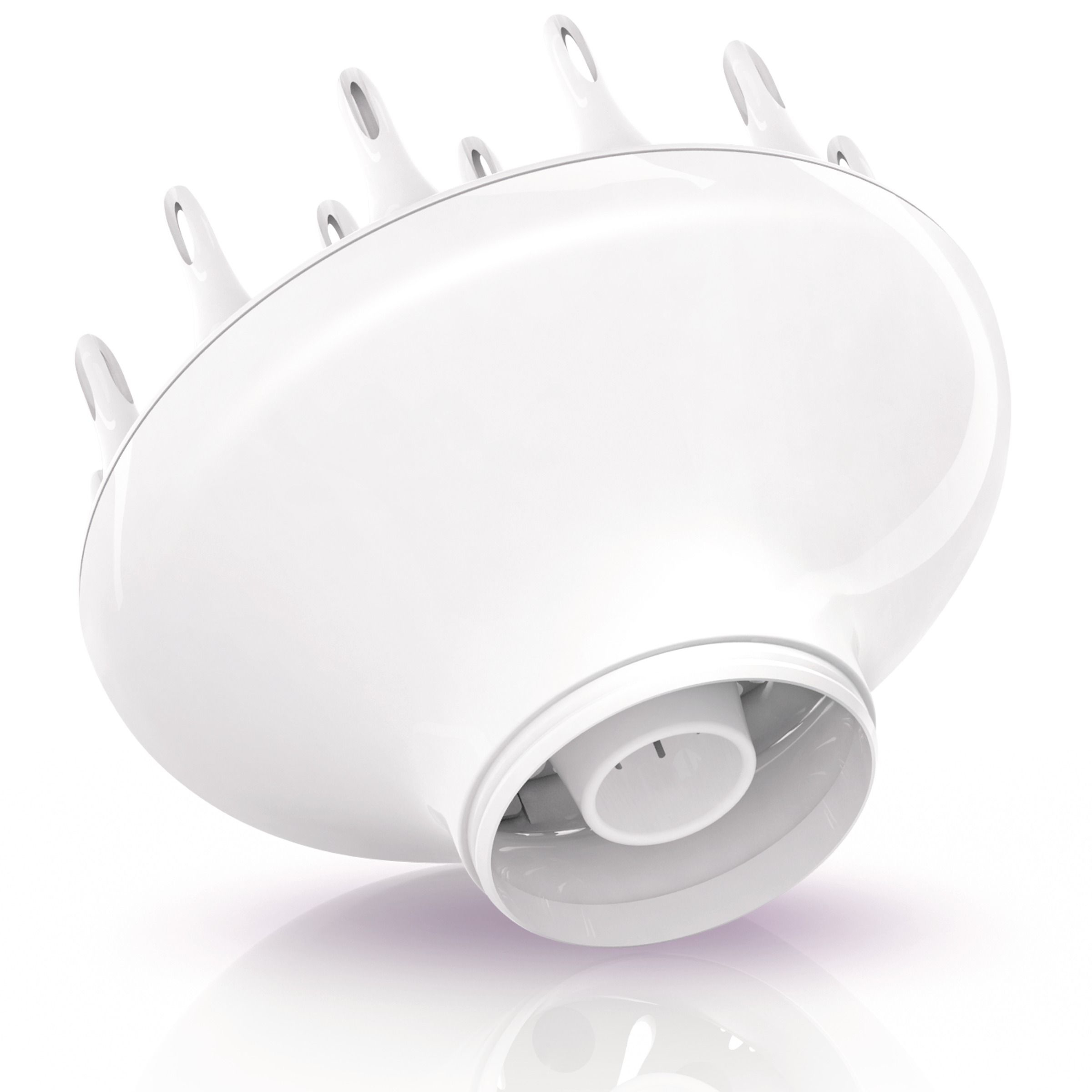 Witte diffuser-opzetstuk voor de föhn. Het heeft een ronde vorm, met meerdere gaten.