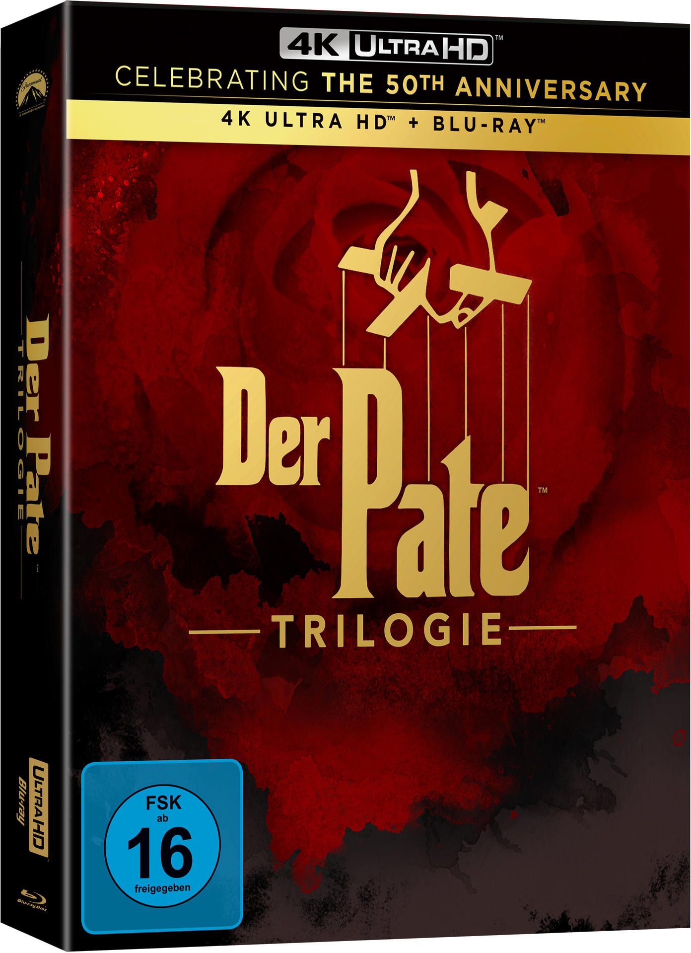DVD-Box von 'Der Pate - Trilogie'. Es hat ein rotes Rosendesign und das Etikett ist auf Deutsch.