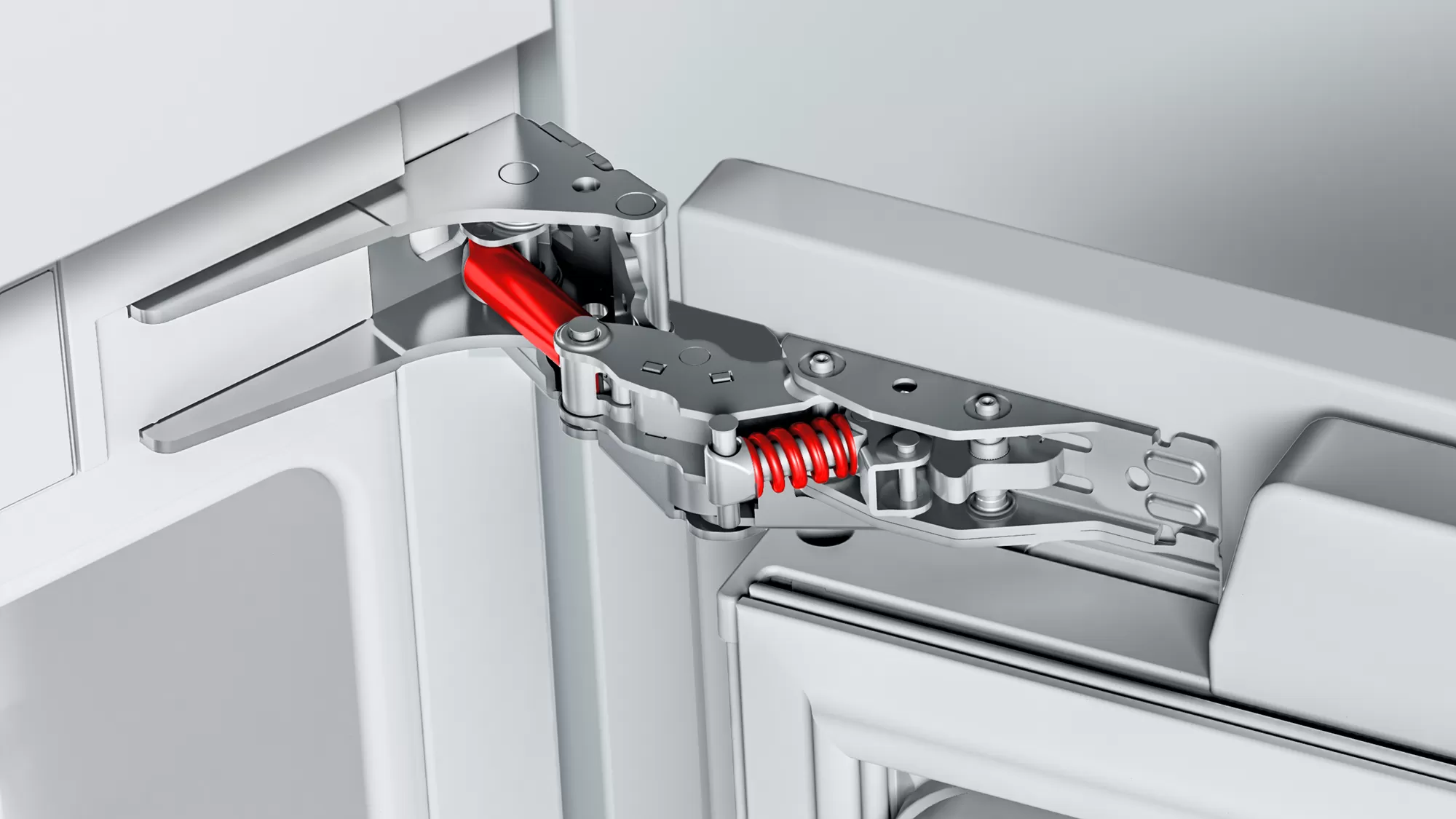 Nahaufnahme eines Kühlscharniers mit roter Feder, die mechanischen Details zeigend. Weißer Hintergrund.