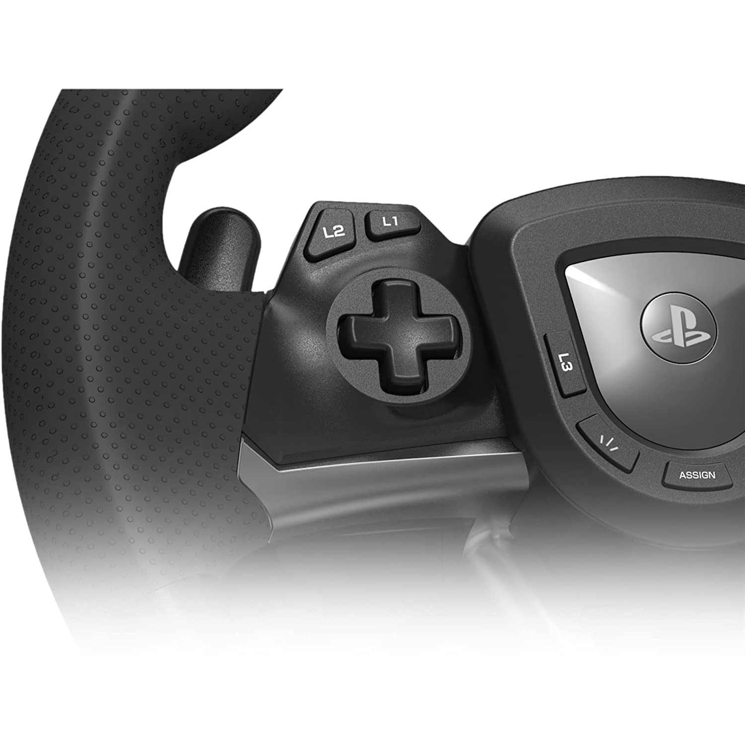Primer plano de un volante de juego negro con botones y un logotipo central de PlayStation.