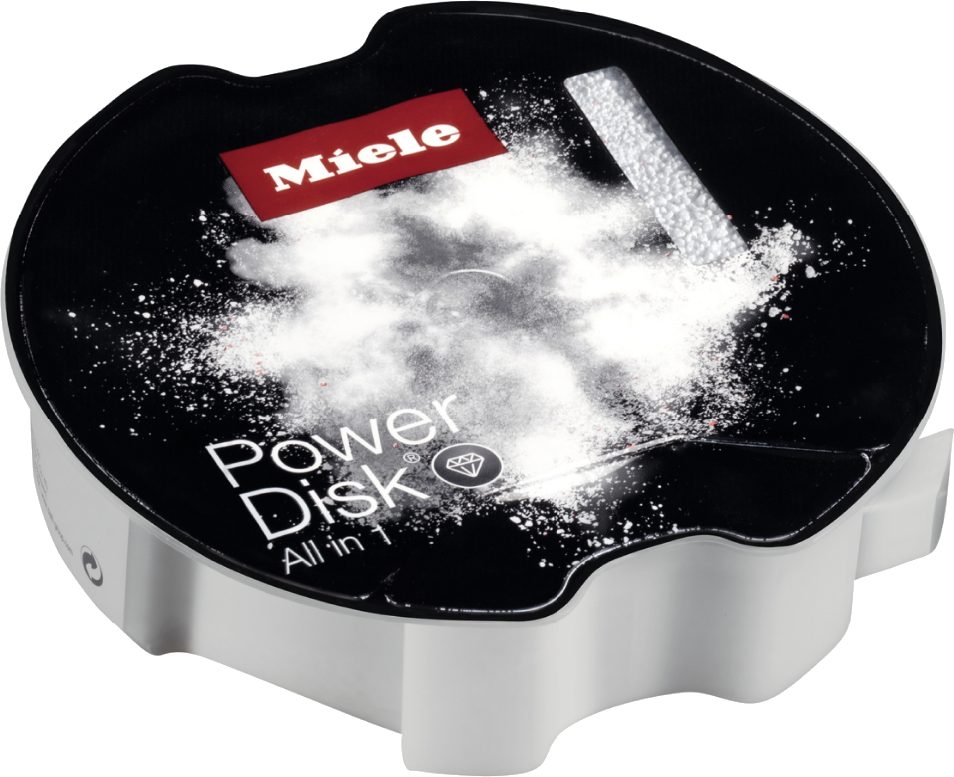 Zwarte, ronde container van Miele Power Disk wasmiddel met wit poeder erin.