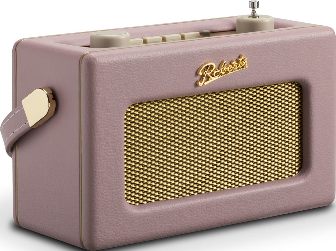 Ein rosafarbener Roberts-Radio mit goldenem Lautsprechergrill und Griff.