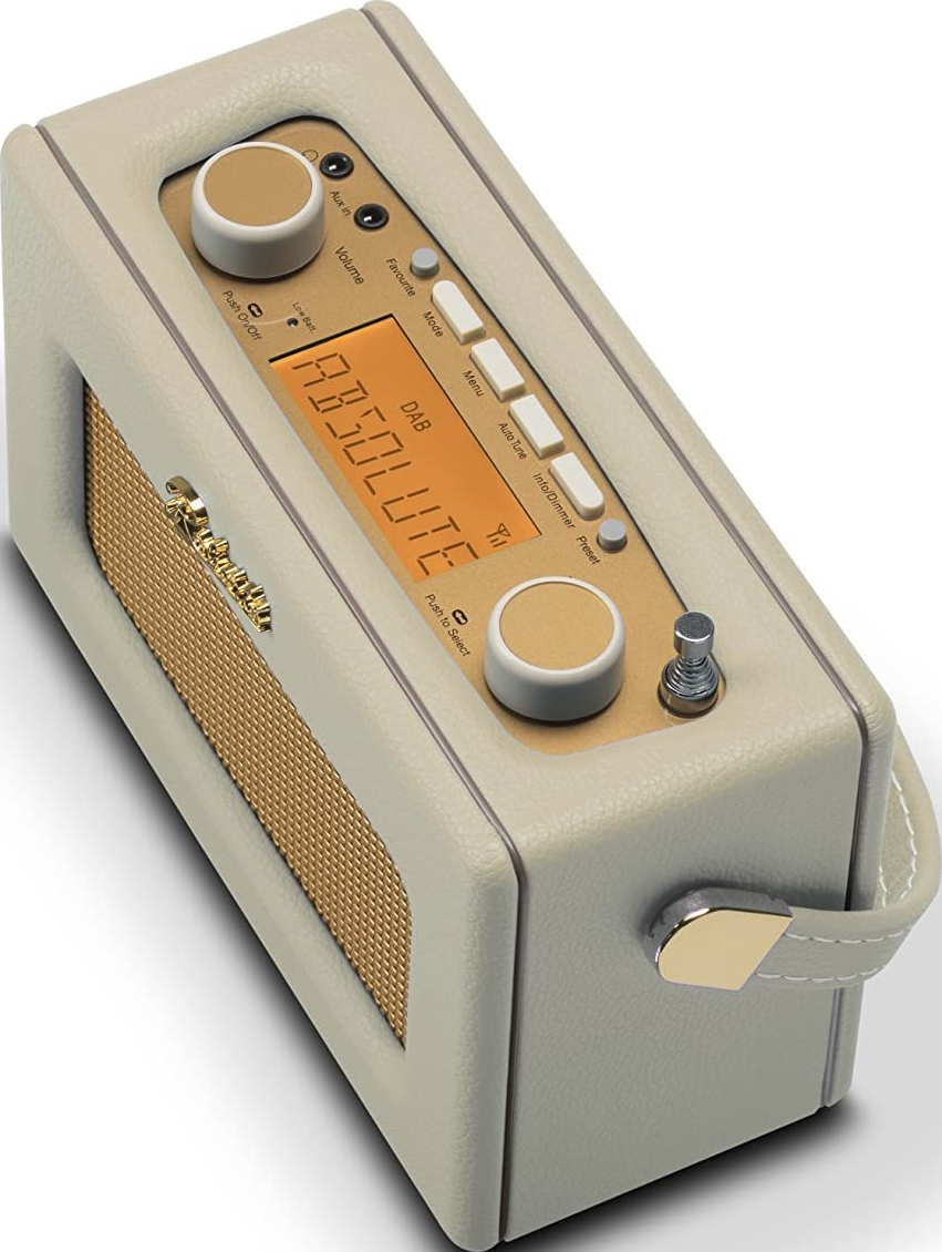 Eine cremefarbene Retro-Radio mit goldenem Lautsprechergrill und orangefarbenem Display mit 'ABSOLUTE'.