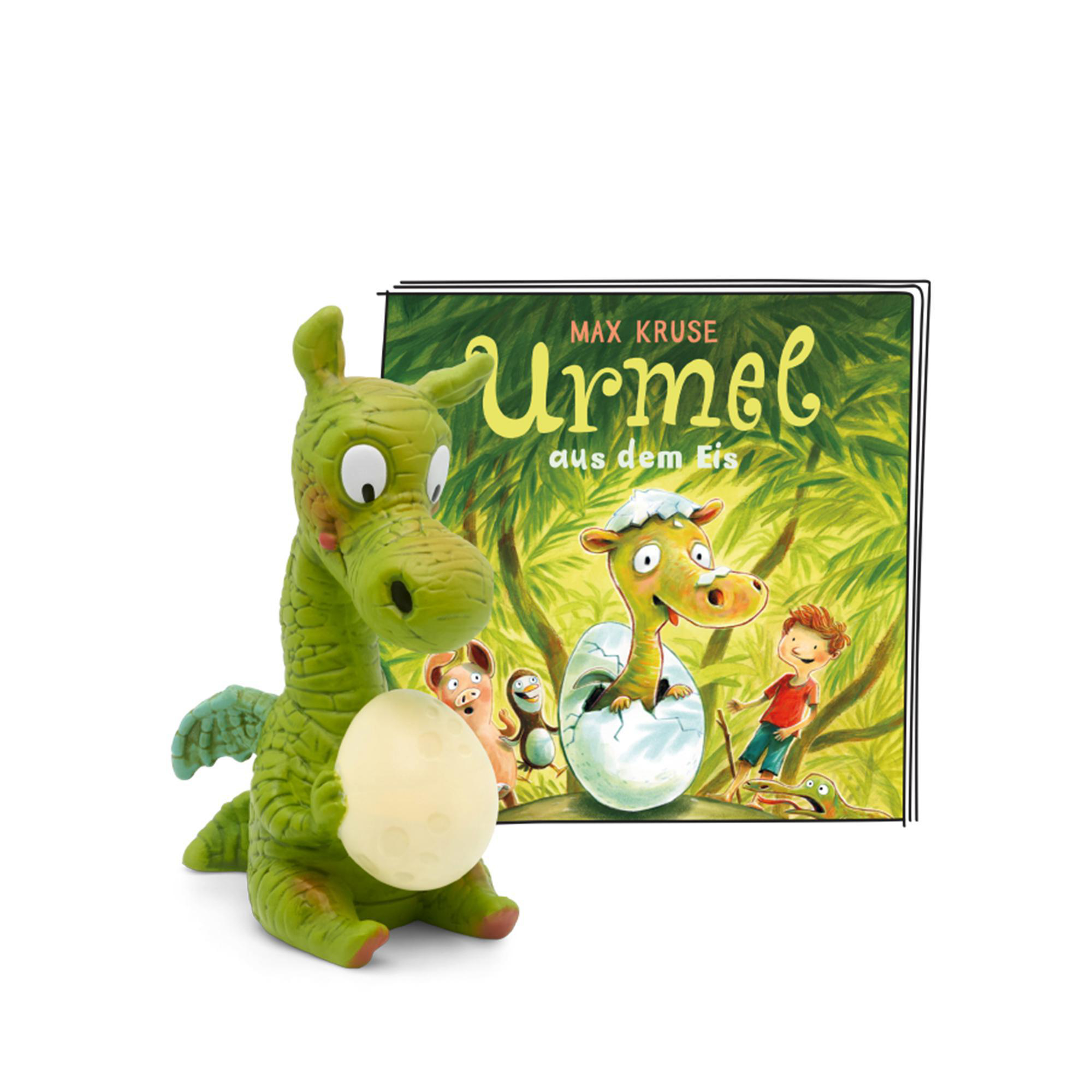 Ein grünes Drachenspielzeug mit einem Buch. Ein Zeichentrickdrache ist im Ei. Das Spielzeug links.