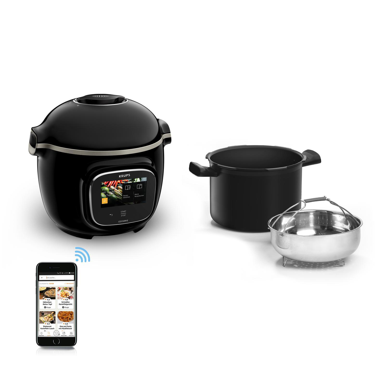 Ein schwarzer Krups Multi-Kocher mit Zubehör: ein Topf und ein Dampfgarer. Ein Telefon zeigt Rezepte.