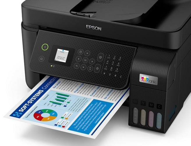 Black Epson printer printing a colorful graph on paper. Ink tank is visible on the side.
