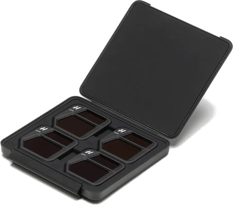 Black camera filters in case. Square filters in black case. Open lid.
