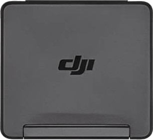 Black DJI product, top view, showing the DJI logo. The product is rectangular with a rounded edge.
