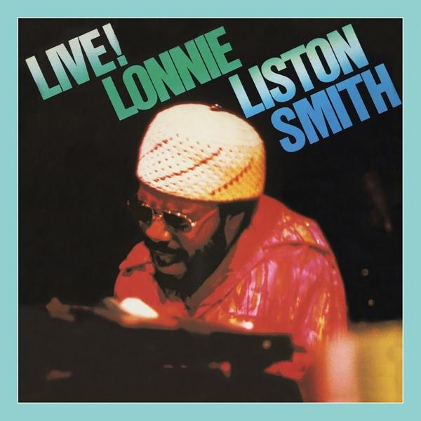 Pochette d'album avec Lonnie Liston Smith. Personne au clavier. Texte bleu et vert.