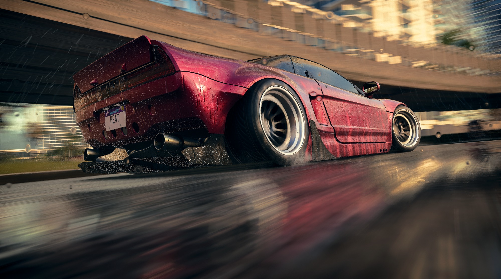 Roter Sportwagen, der auf nasser Straße driftet.