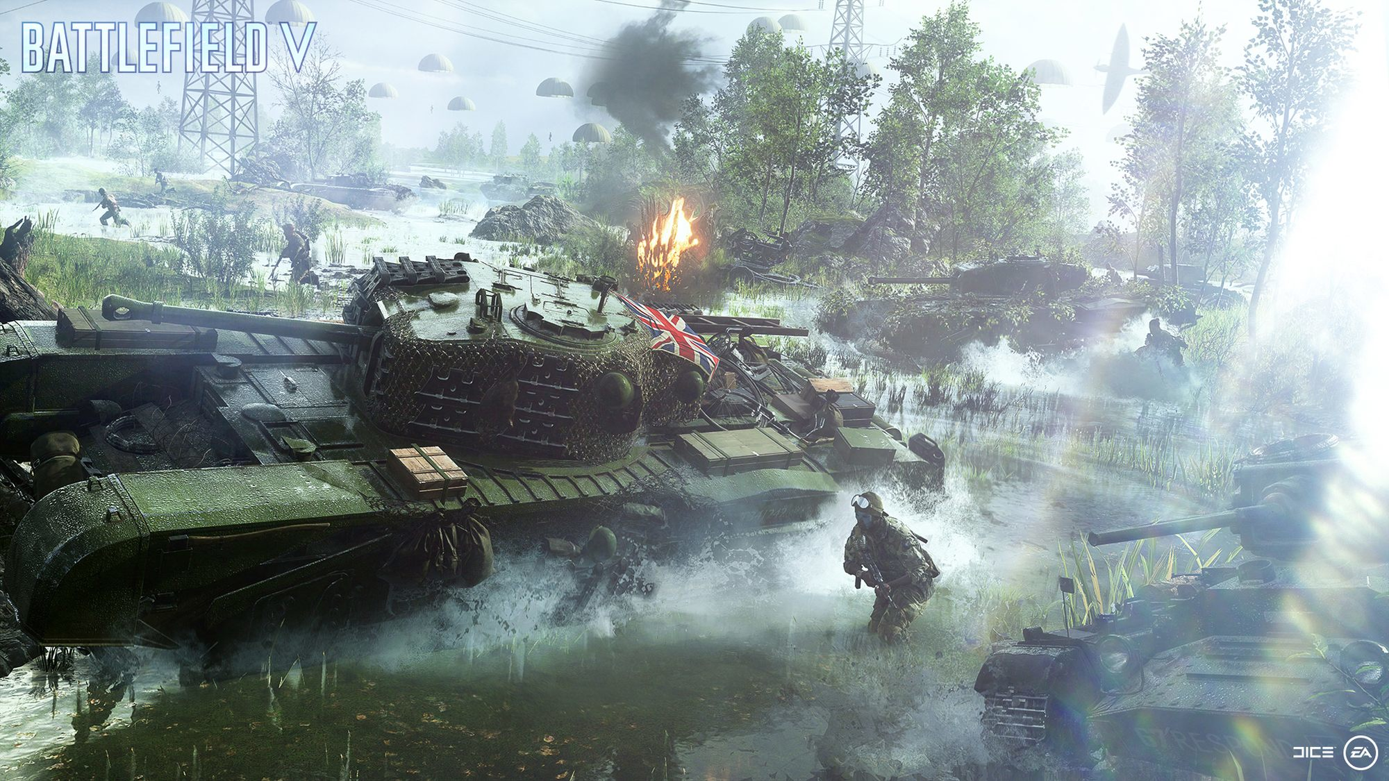Une scène de Battlefield V avec des chars dans l'eau, des soldats, des explosions et un drapeau britannique.