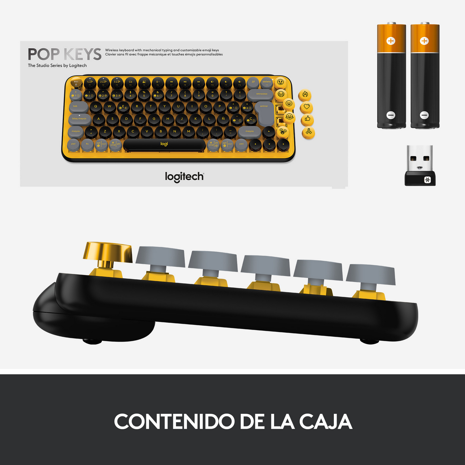 Se muestra un teclado amarillo y negro con teclas adicionales, baterías y un receptor USB.