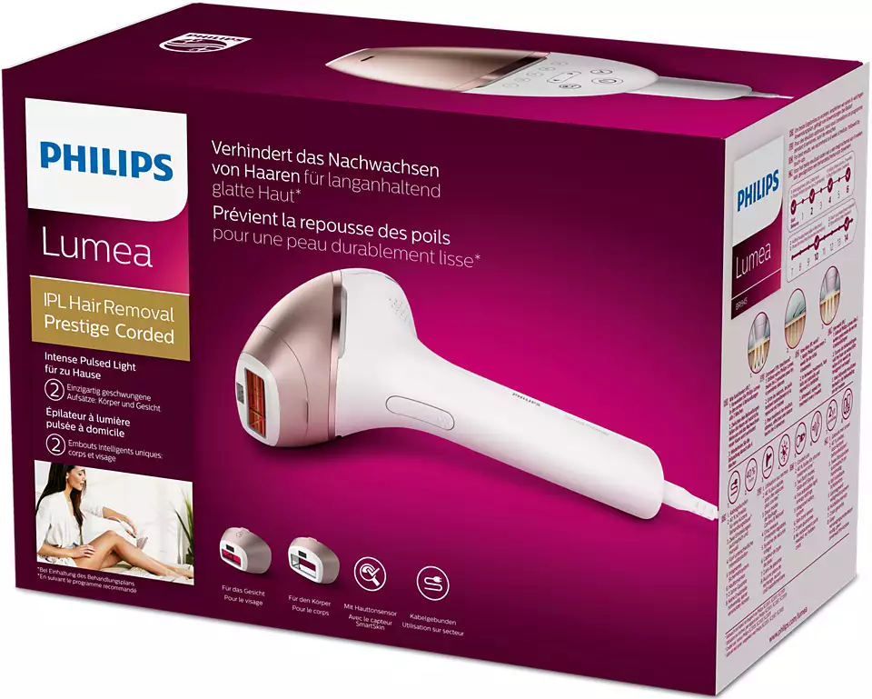 Appareil d'épilation IPL Philips Lumea dans une boîte, avec un appareil blanc et or rose.