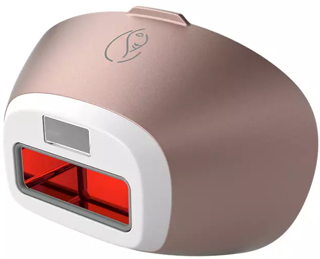 Un appareil d'épilation or rose avec une sortie de lumière rouge.