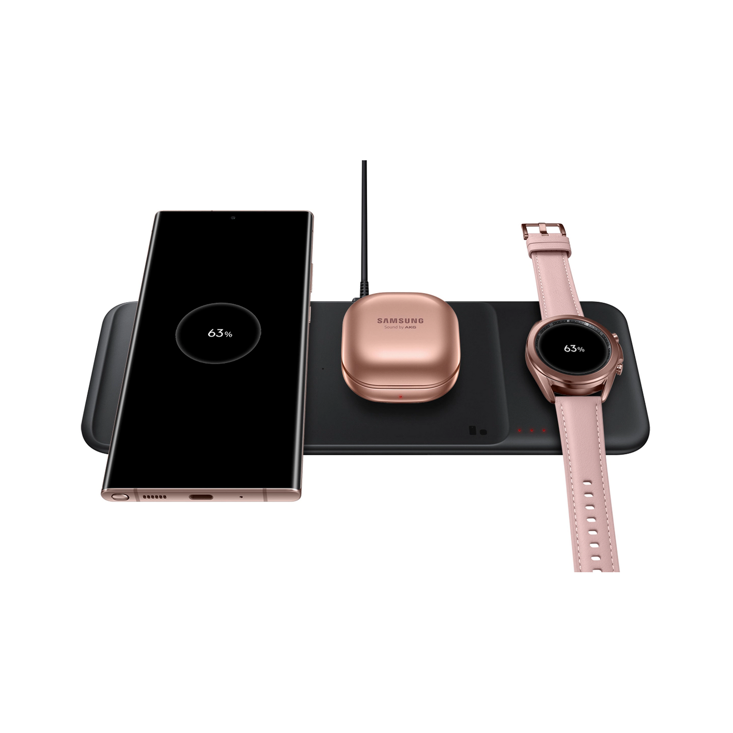 Base de carga inalámbrica con un teléfono, estuche de auriculares y reloj. Todos son oro rosa y se cargan.