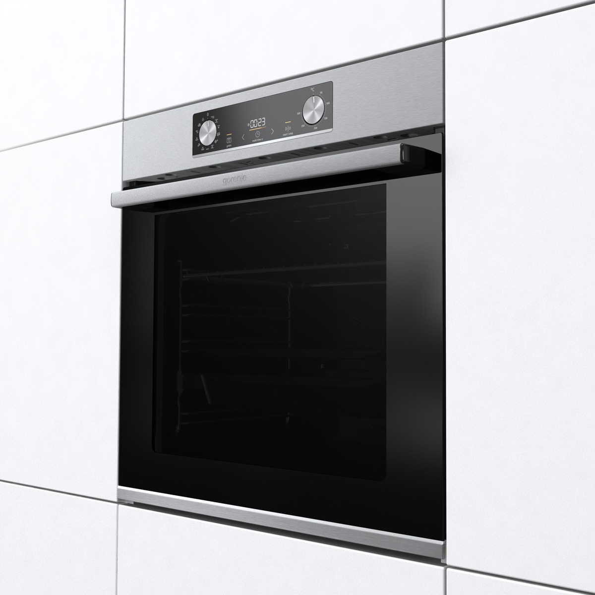 Einbau-Edelstahlofen in einem weißen Schrank. Er hat eine schwarze Glastür und ein Digitaldisplay.