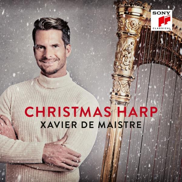 Férfi pulóverben hárfával. A szöveg: 'Christmas Harp' és 'Xavier De Maistre'. Hó effektus. Sony Classical logó.
