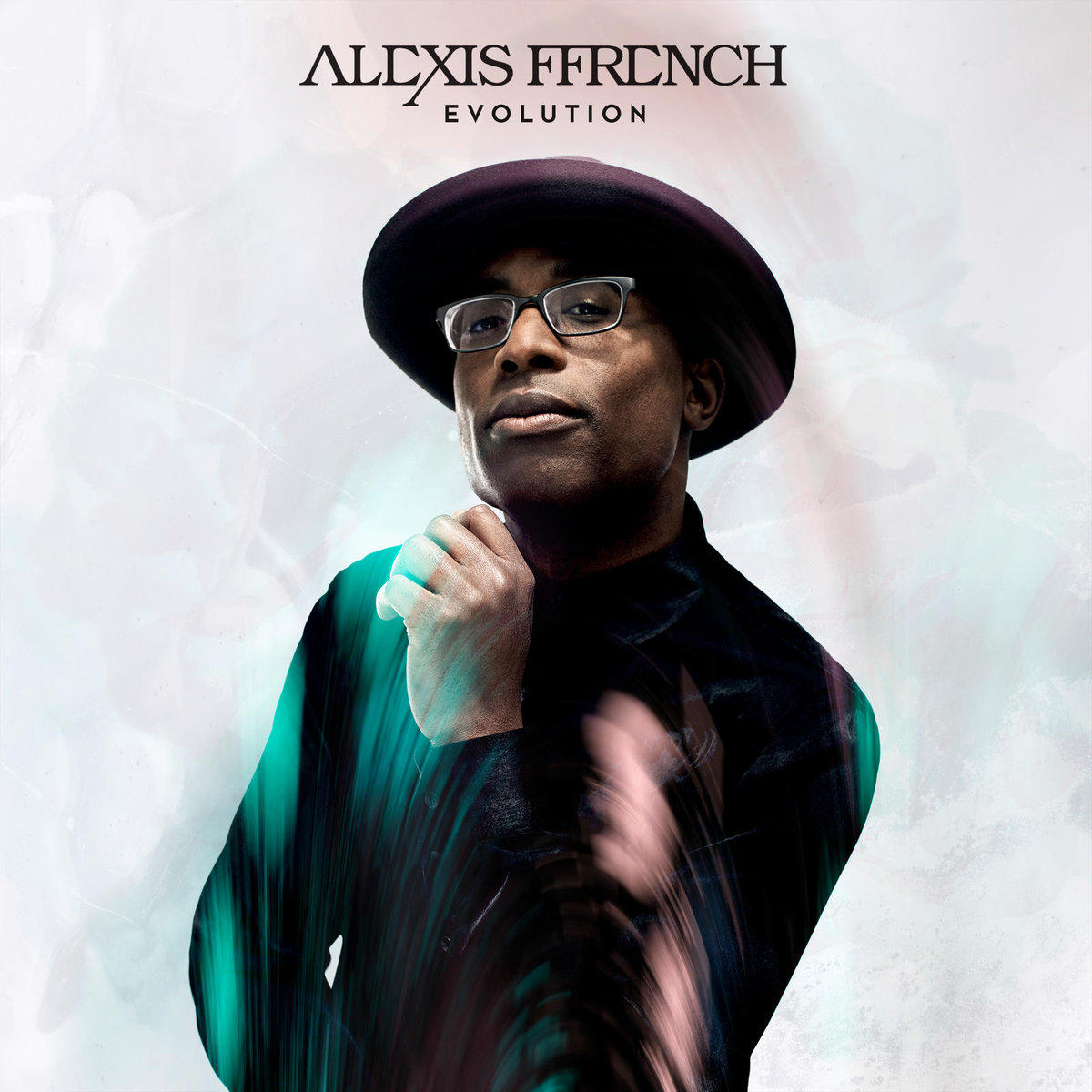 Kalapot és szemüveget viselő férfi. Album borító 'ALEXIS FFRENCH' felirattal.