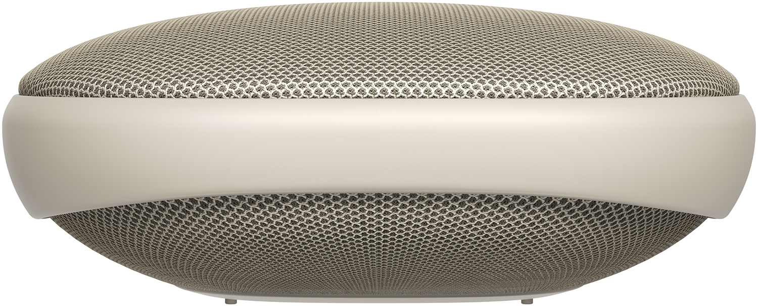 A beige speaker with a mesh front and a white band, isolated on a white background.