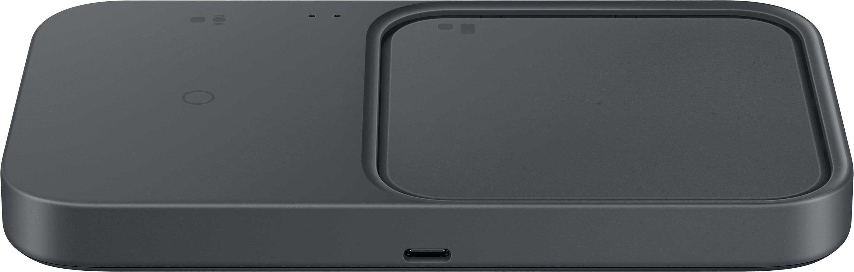 Un caricabatterie wireless grigio scuro con due basi di ricarica e una porta USB.