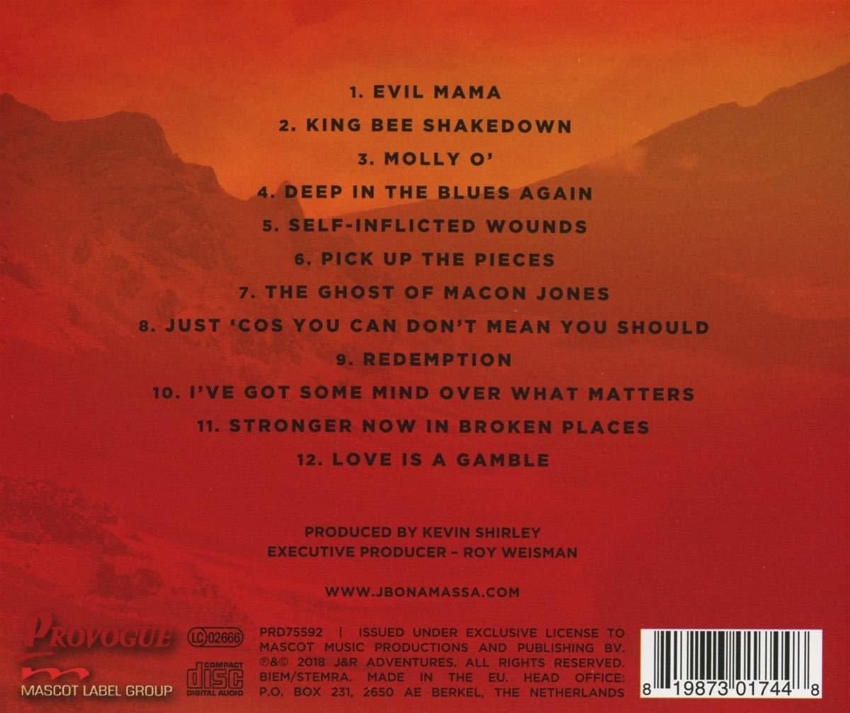 Egy CD borítója a dalcímek listájával és egy vonalkóddal.