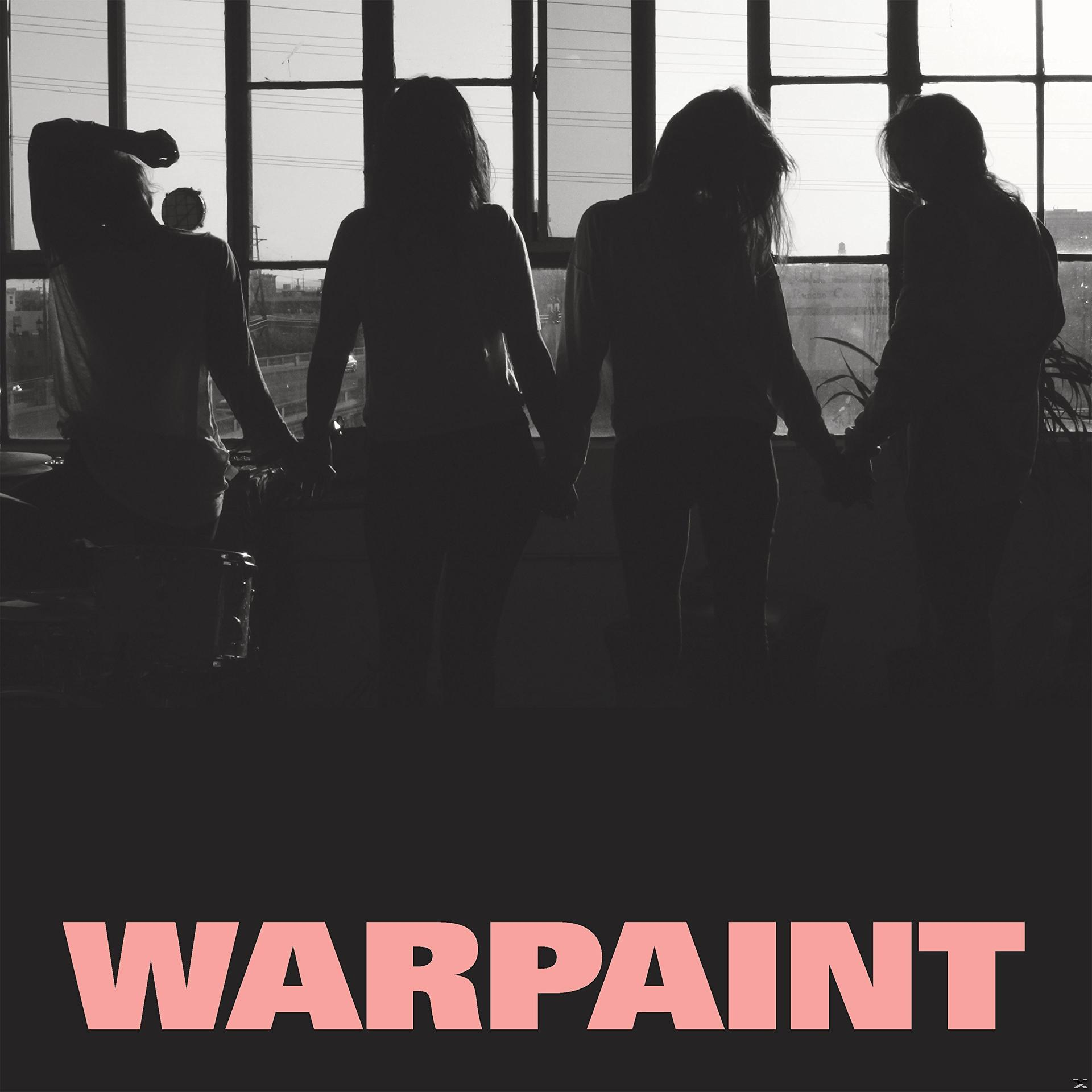 Schwarzweißfoto von Frauen, die Hände halten, silhouettenartig vor einem Fenster, mit Text 'WARPAINT'.
