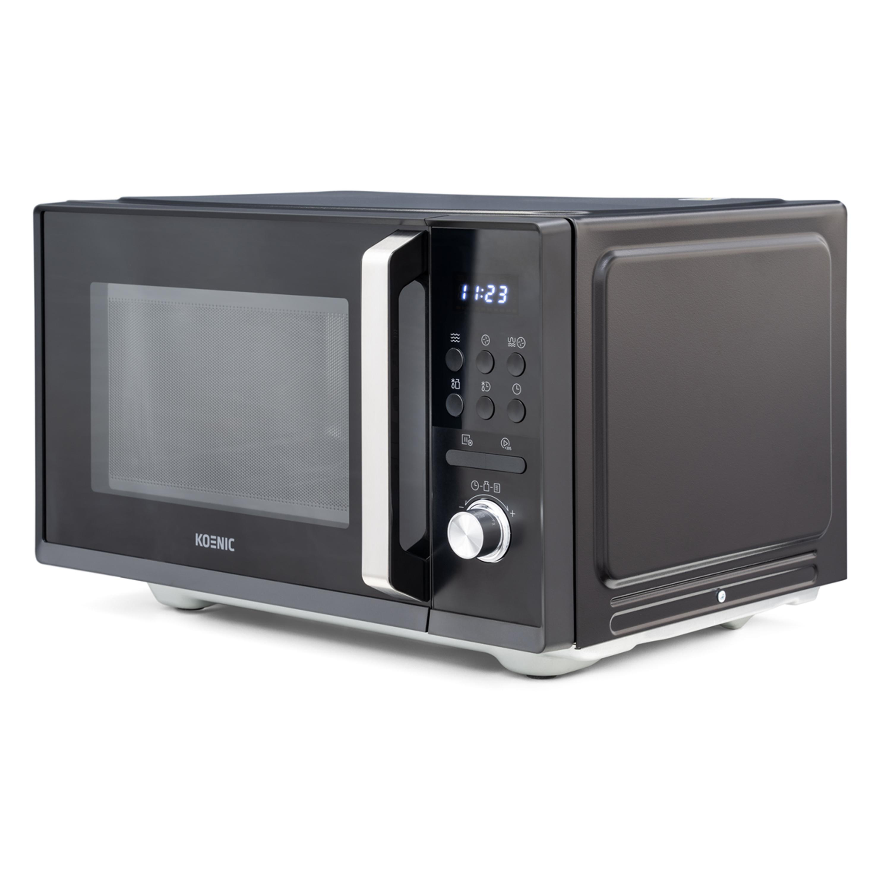 Schwarze Mikrowelle mit Digitalanzeige, Knöpfen und silbernem Griff. Sie steht auf einer weißen Oberfläche.