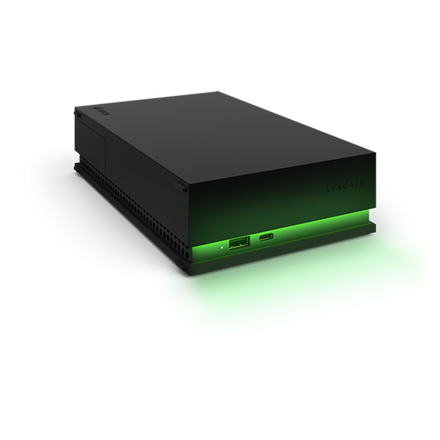Un disco duro externo Seagate negro con una tira de luz verde.