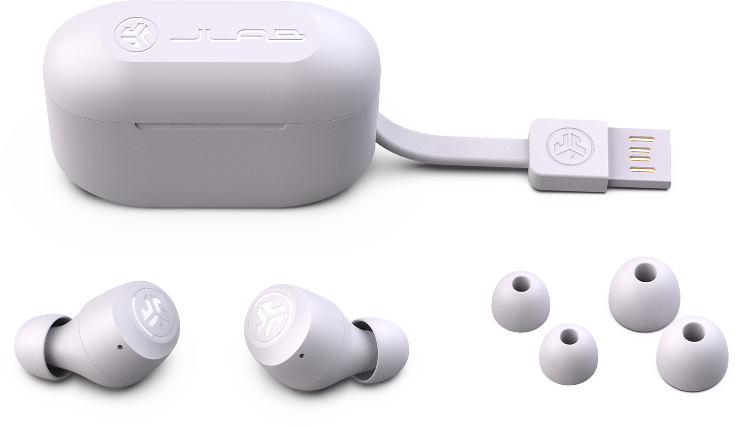 White wireless earbuds, charging case, and extra ear tips on white background.
