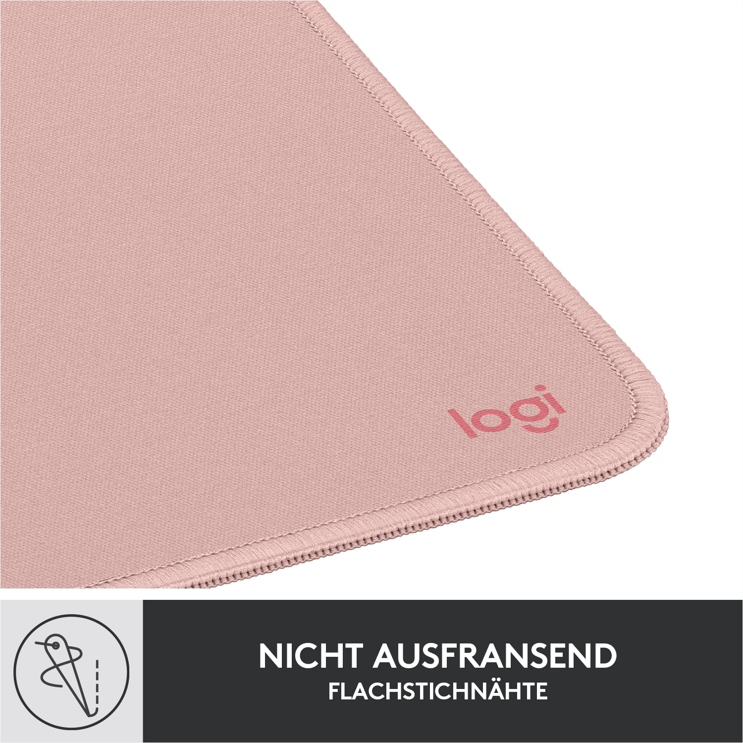 Ein rosa Mousepad mit einer genähten Kante und dem Logitech-Logo.