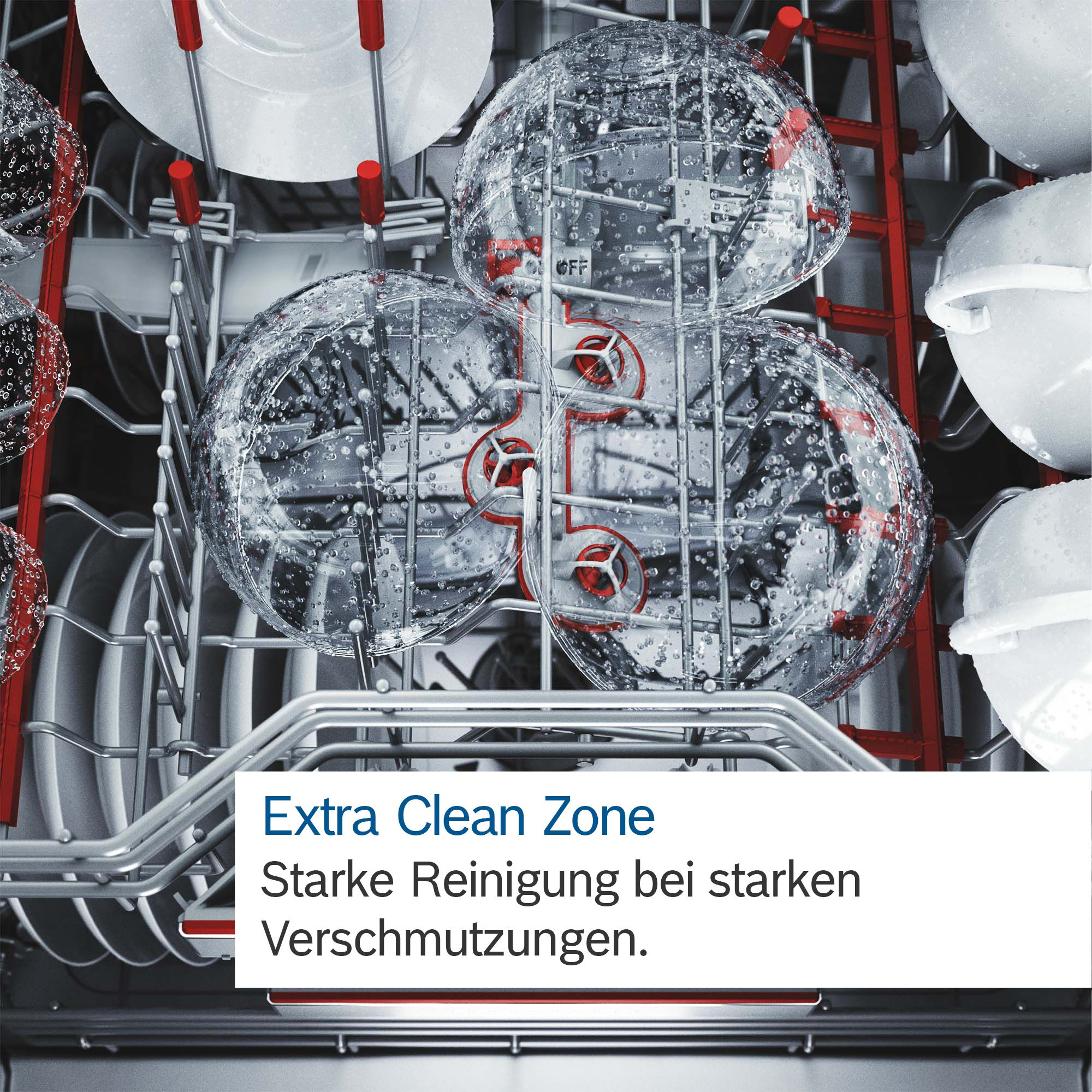 Geschirrspüler-Innenraum mit Geschirr und transparenten Schalen mit Extra Clean Zone-Text.