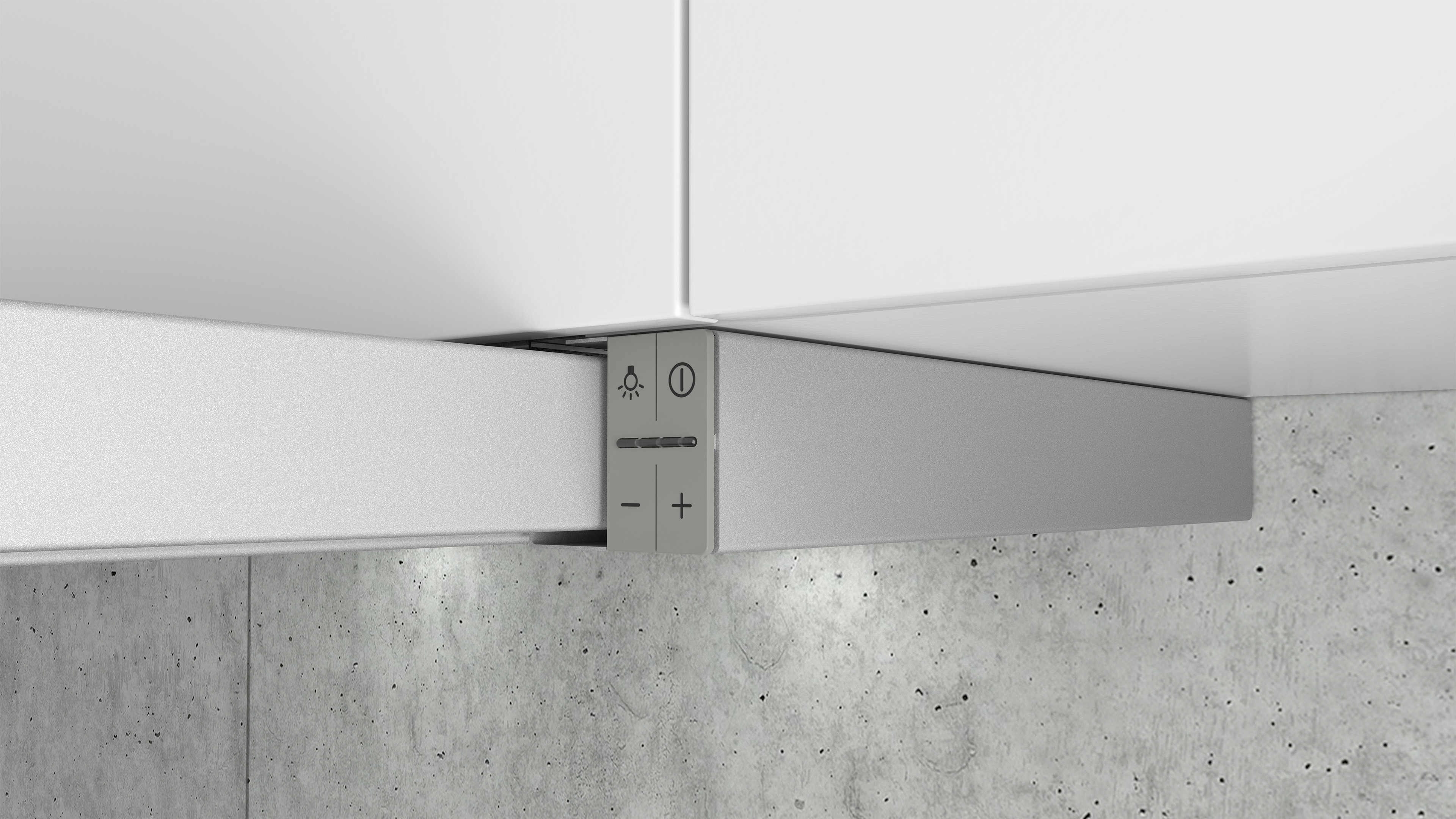 Panneau de contrôle argenté sur mur béton avec symboles lumière.