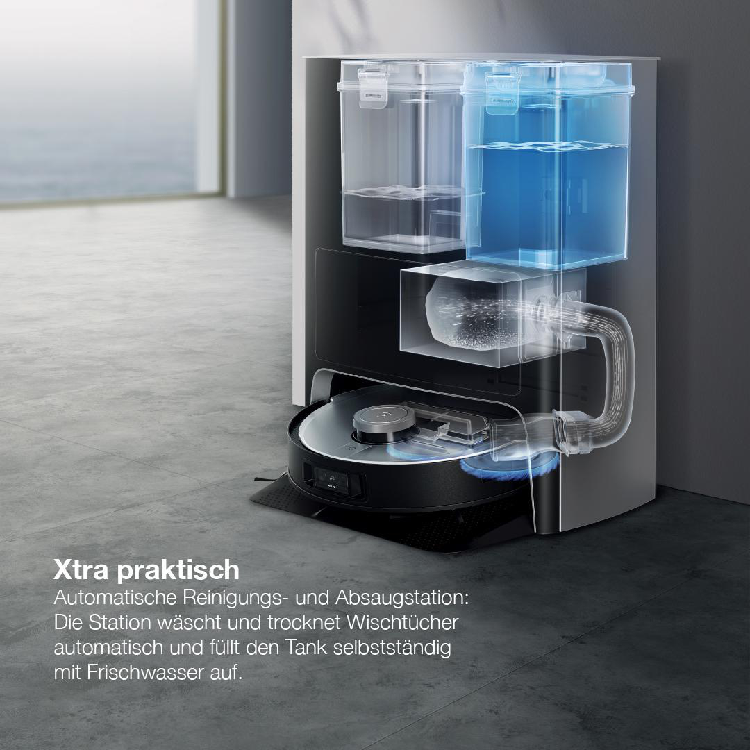 Ein weiß-schwarzer Roboter-Staubsauger mit Wassertanks.