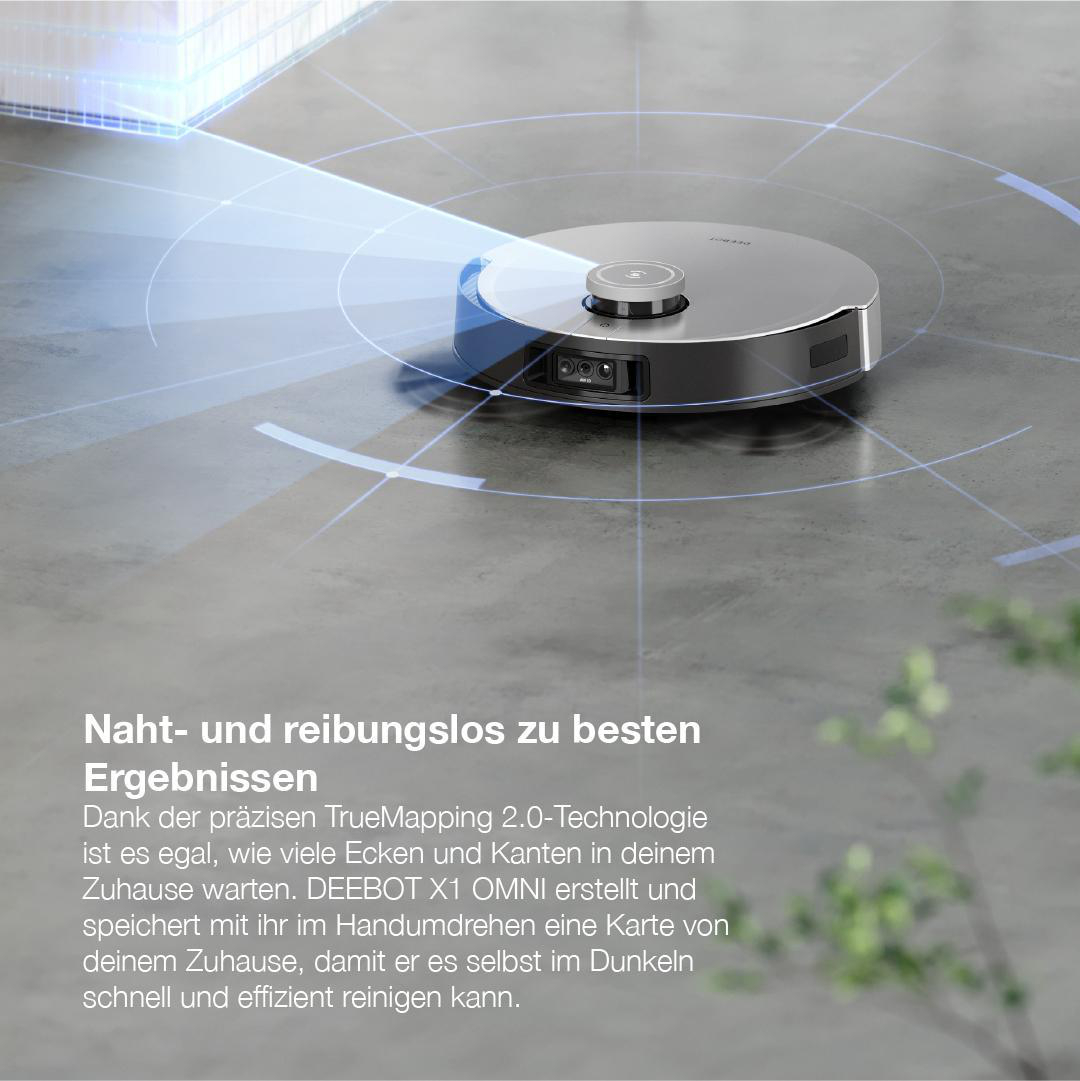 Silberner Roboter-Staubsauger auf grauem Boden, mit Text darunter auf Deutsch.