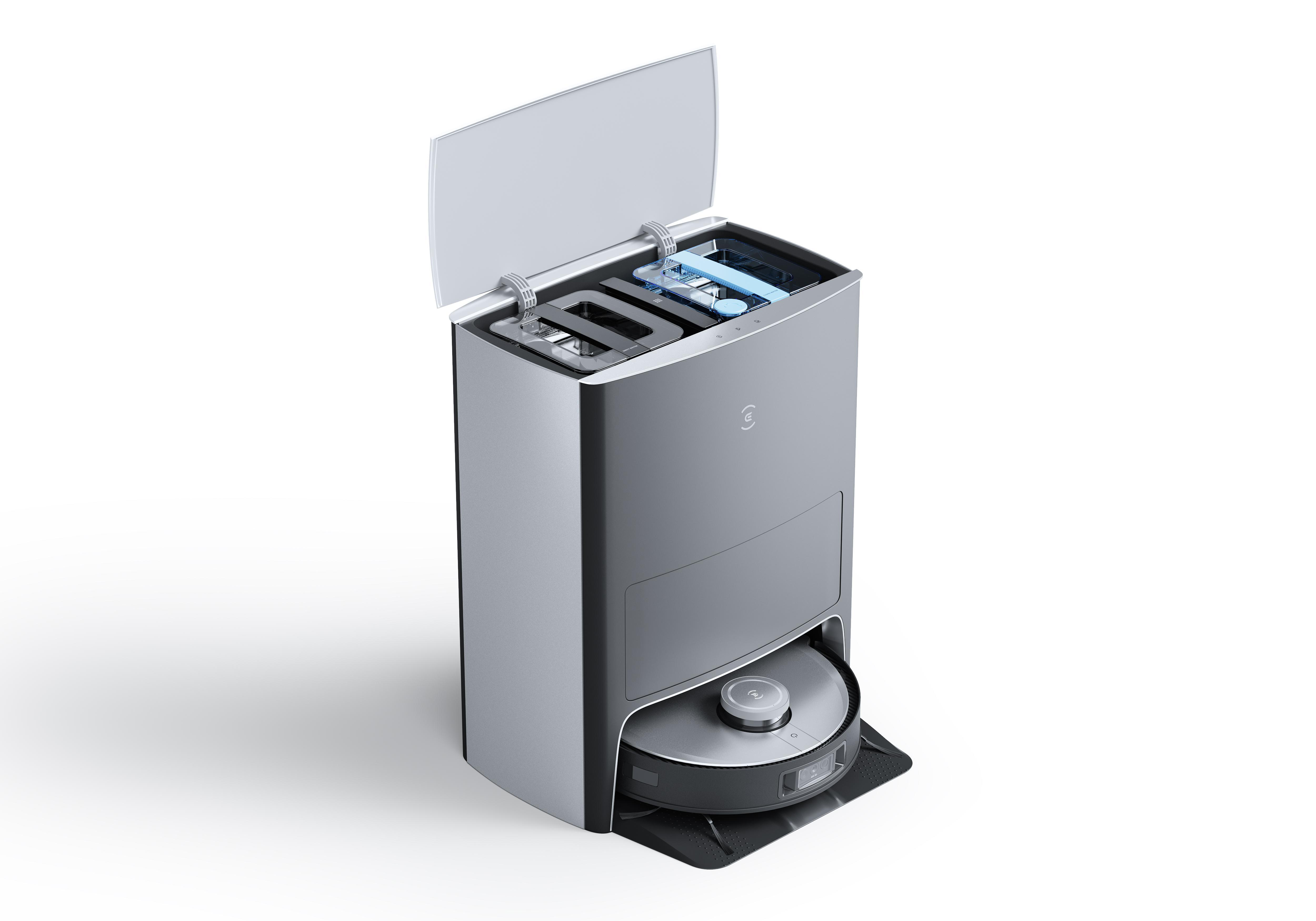 Ein silberner und schwarzer Roboter-Staubsauger mit Reinigungsstation, Deckel offen.