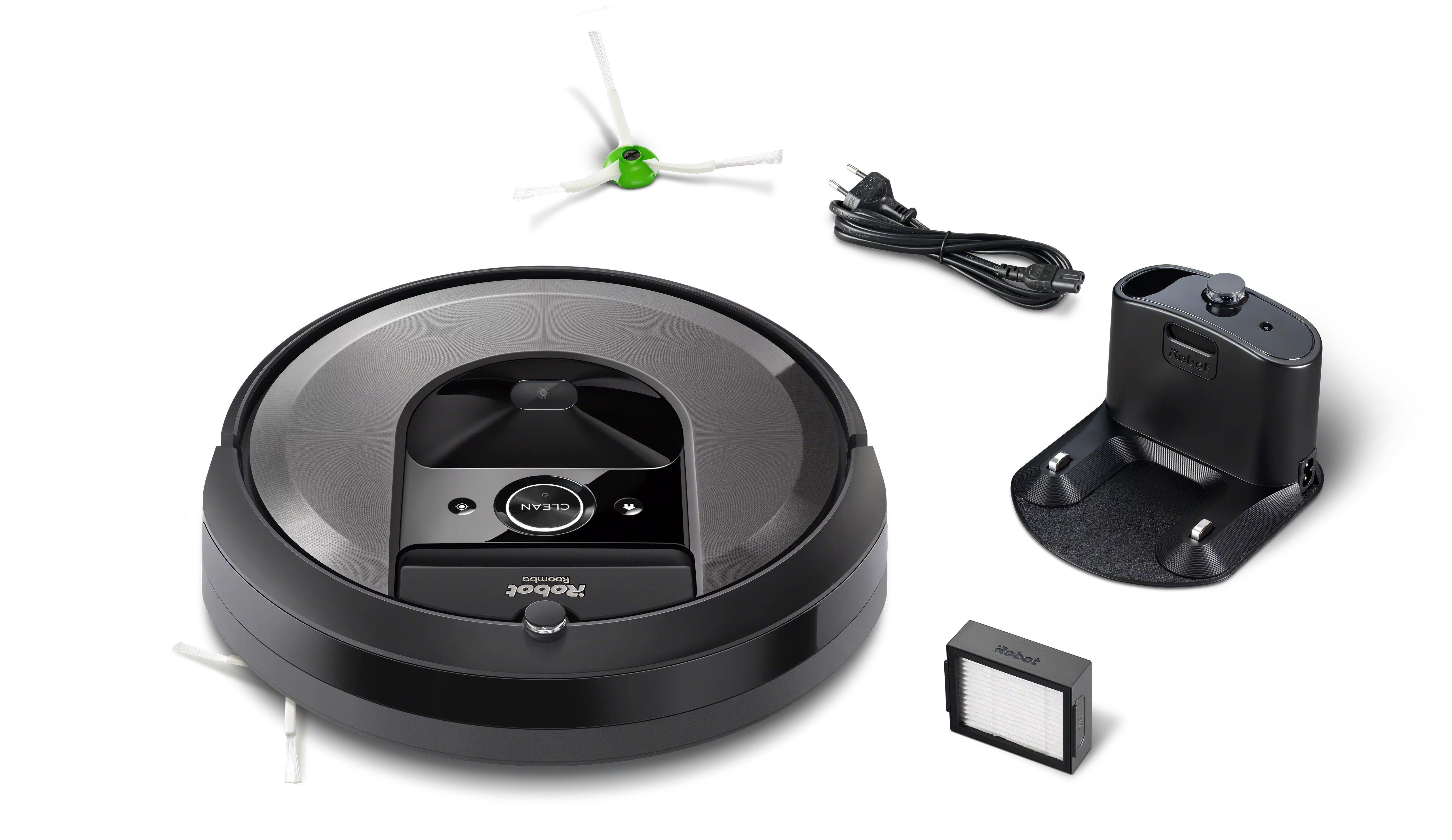 Schwarzer Roomba-Staubsaugerroboter mit Zubehör: Ladegerät, Bürste und Filter auf Weiß.
