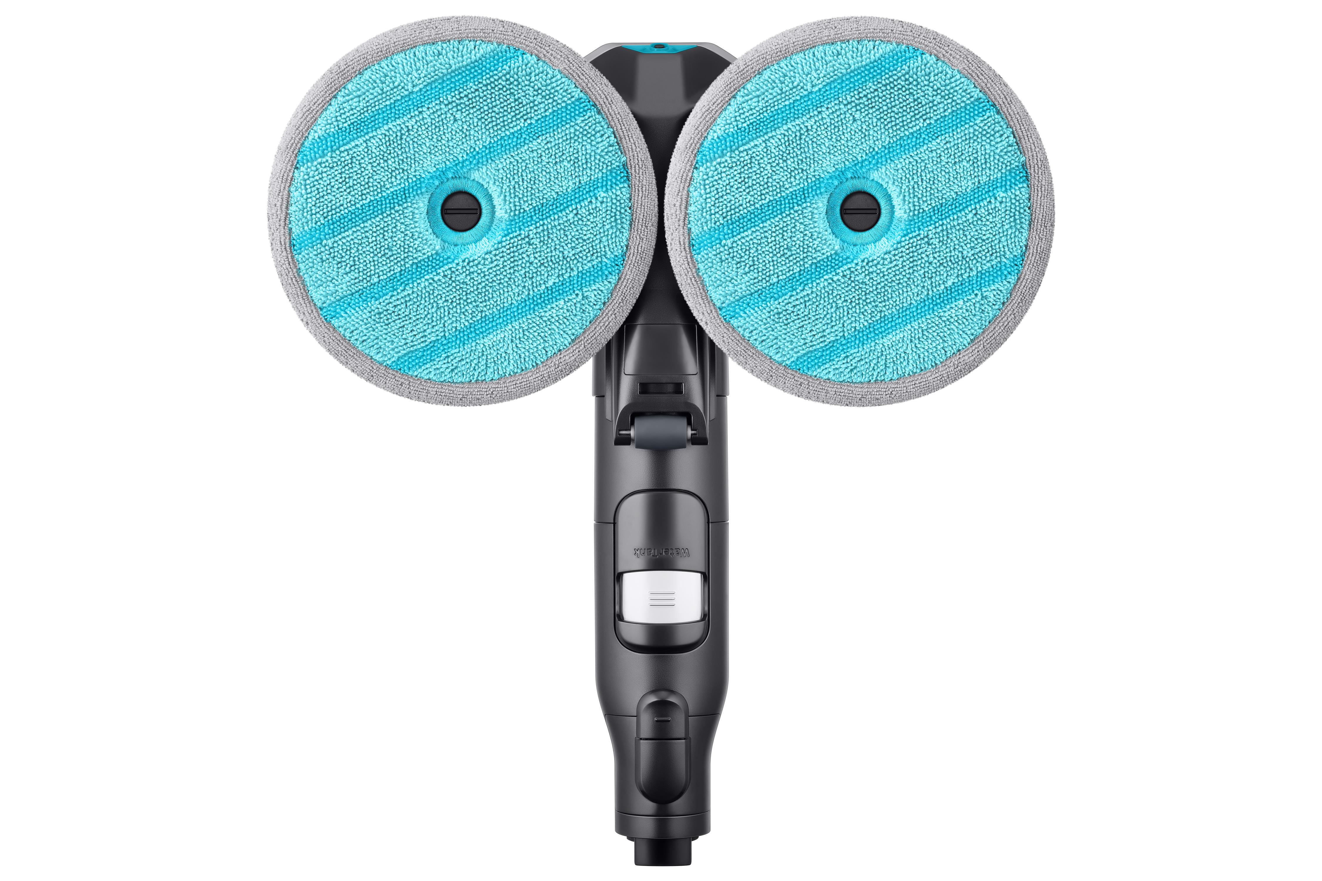 Ein Bodenreinigungsgerät, das zwei rotierende blaue Pads und den Griff zeigt.